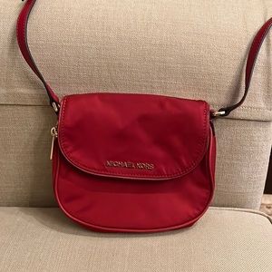Michael Kors Red Satin Crossbody with gold hardware and magnetic closure.